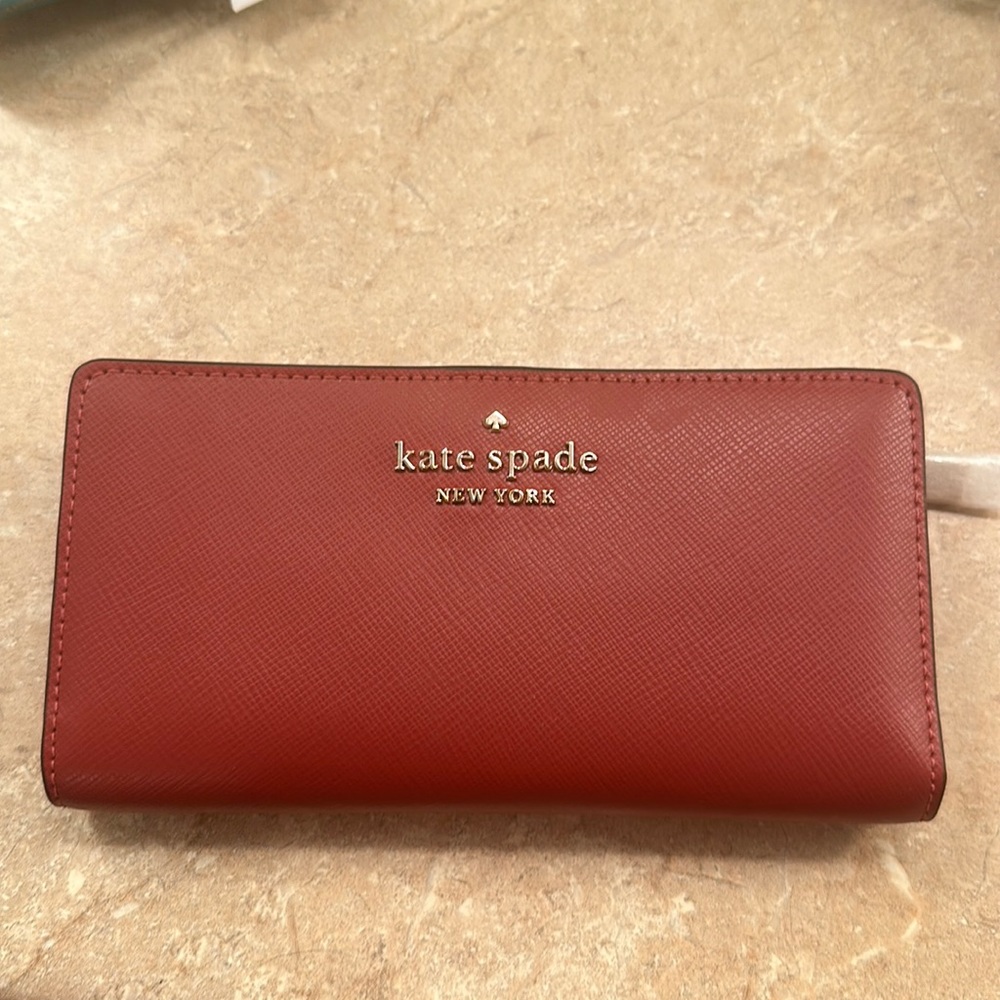 Brand new with tags, Kate Spade saffiano leather bifold wallet.